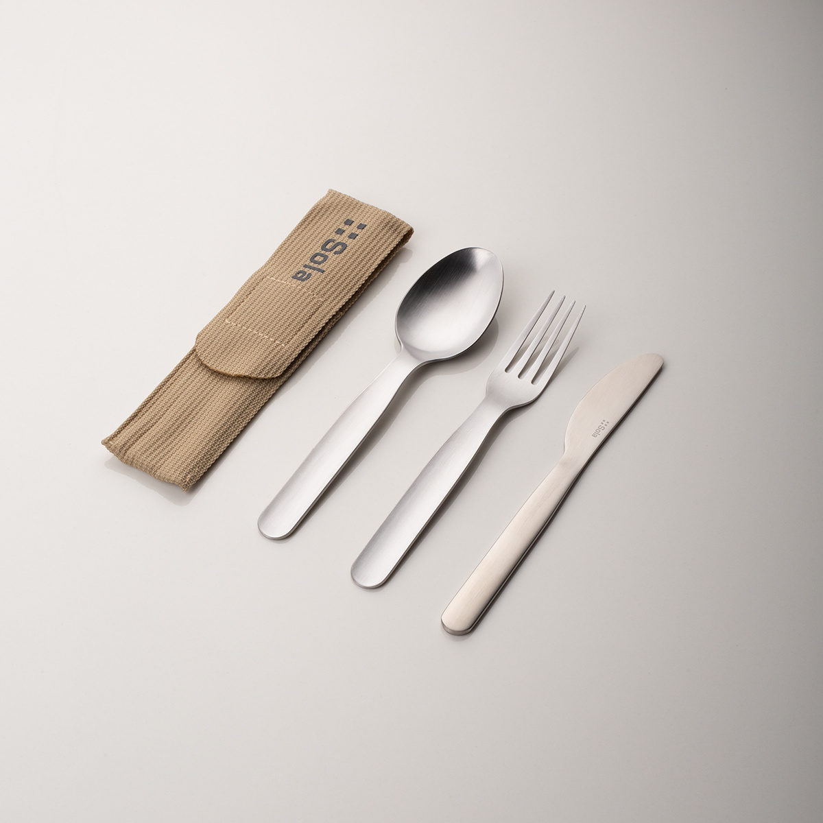 Cutlery set 3 pcs in beige bag with SOLA logo